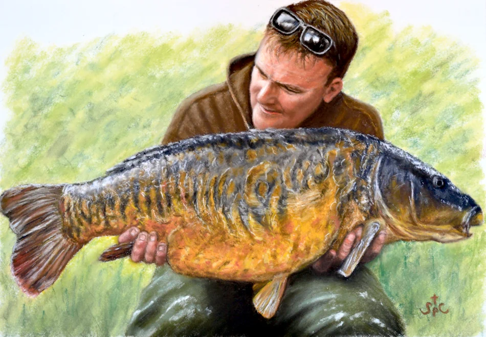 Portrait of a man holding a large mirror carp after a successful catch